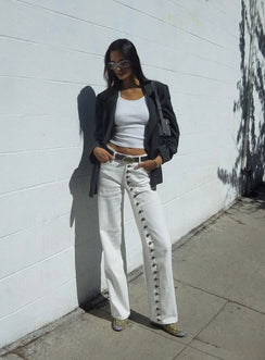 Showcasing the Penny Mid Rise Straight Leg Jeans White in womens-jeans with mid-rise front view of model wearing Princess Polly