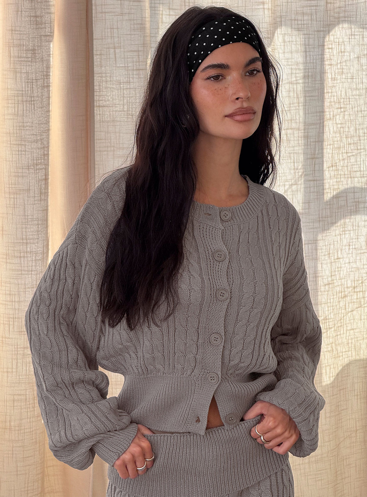 back view of model wearing Princess Polly Baleigh Cable Knit Cardigan Grey Jumpers 