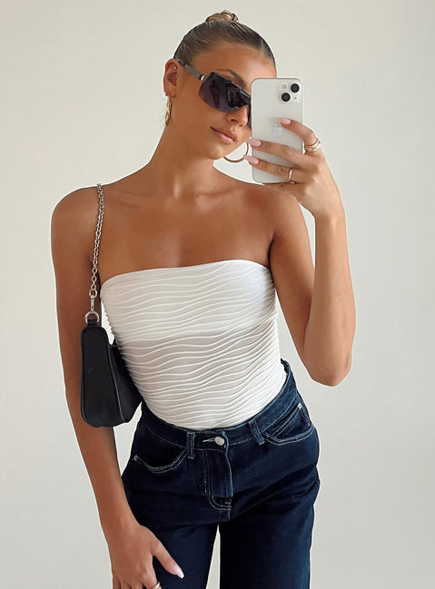 back view of model wearing Princess Polly Makena Strapless Bodysuit White Low Impact Sleeveless 