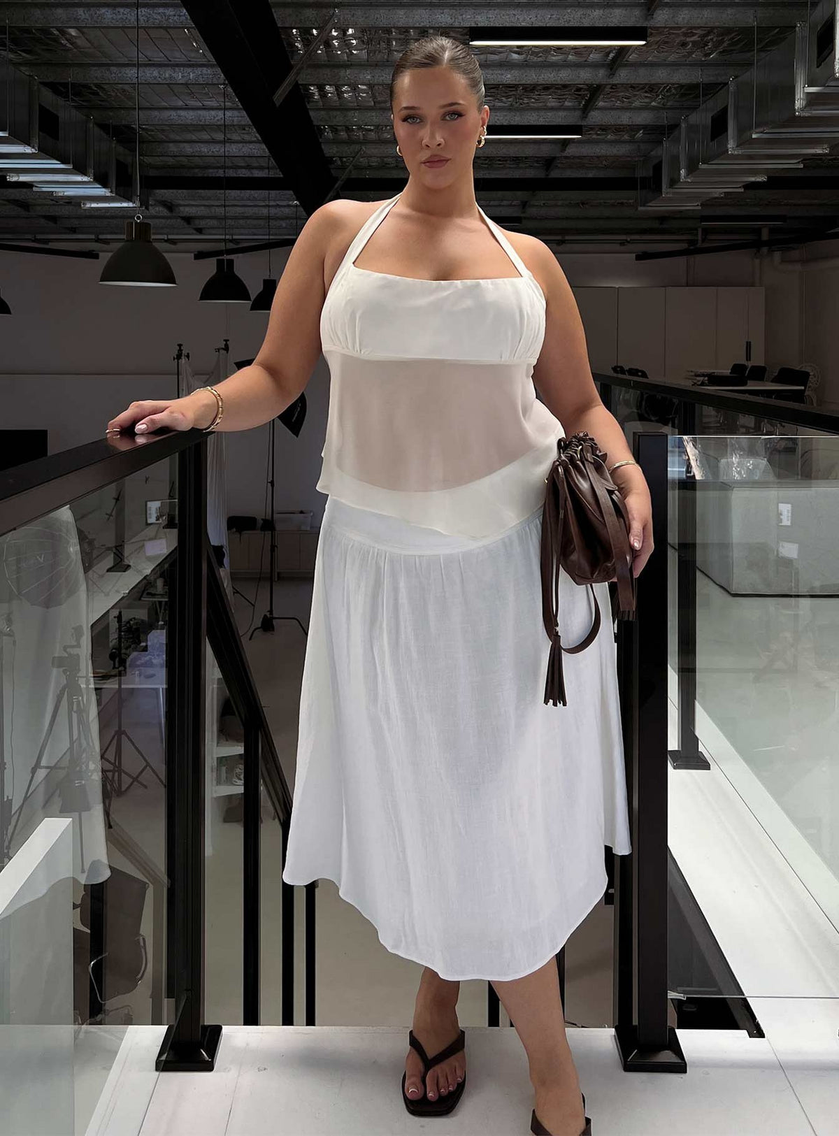 Featuring the Heart Of Gold Linen Blend Midi Skirt White Curve in womens-skirts with midi length front view of model wearing Princess Polly