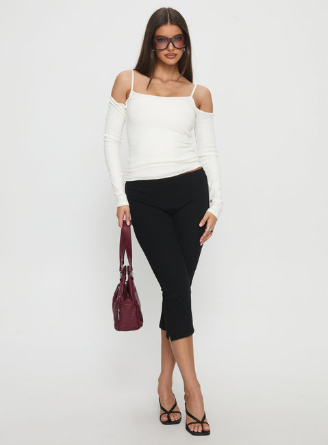 front view of model wearing Princess Polly Baseline Rib Capri Pants Black Tall Mid Rise Pants 