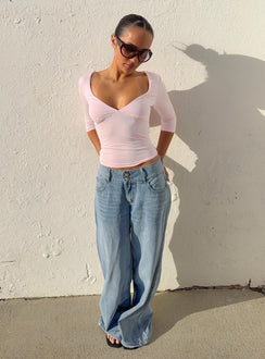 Showcasing Ramos Low Rise Double Button Wide Leg Jeans Light Vintage Blue in womens-jeans with low-rise front view of model wearing