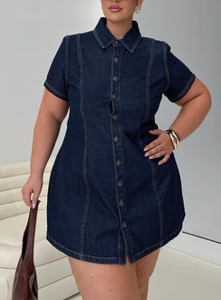 back view of model wearing Princess Polly Perception Denim Mini Dress Mid Wash Curve V-Neck 