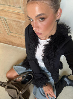 Discover the Brynlie Faux Fur Trim Boxy Cardigan in Black womens-jumpers with short length front view of model wearing Princess Polly