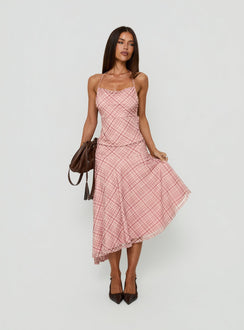 Showcasing the Waverlee Asymmetrical Midi Skirt Pink Check in womens-skirts category with fitted and ruched details front view of model wearing Princess Polly
