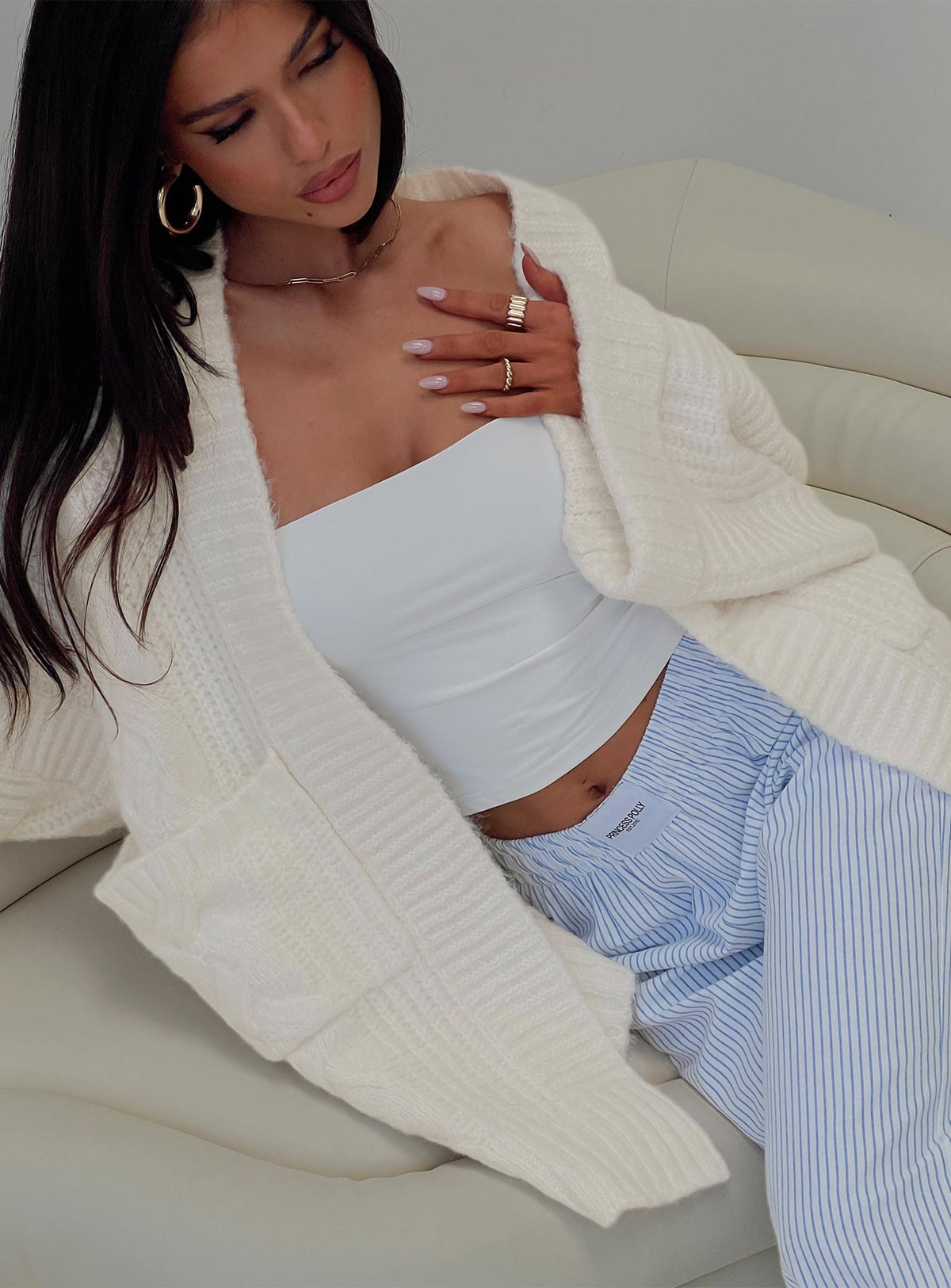 side view of model wearing Princess Polly Paisleigh Cable Knit Cardigan Cream Longline Jumpers Jumpers 