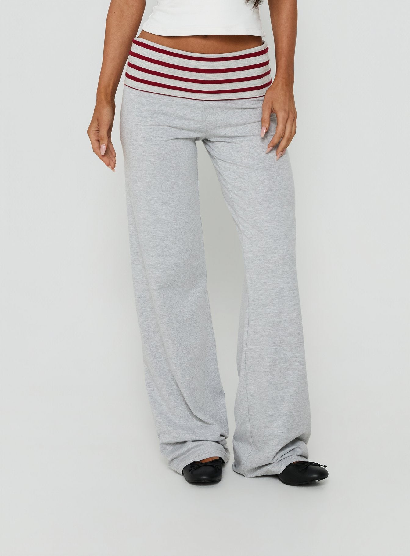 Showcasing Jetset Pants Grey / Red Stripe womens-regular-pants with mid-rise front view of model wearing