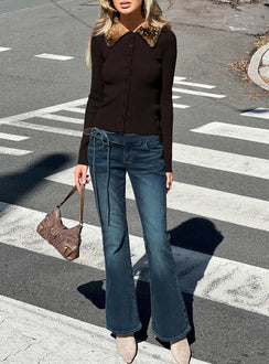 Showcasing Runa Low Rise Tie Side Jeans Mid Blue Wash in womens-jeans front view of model wearing Princess Polly