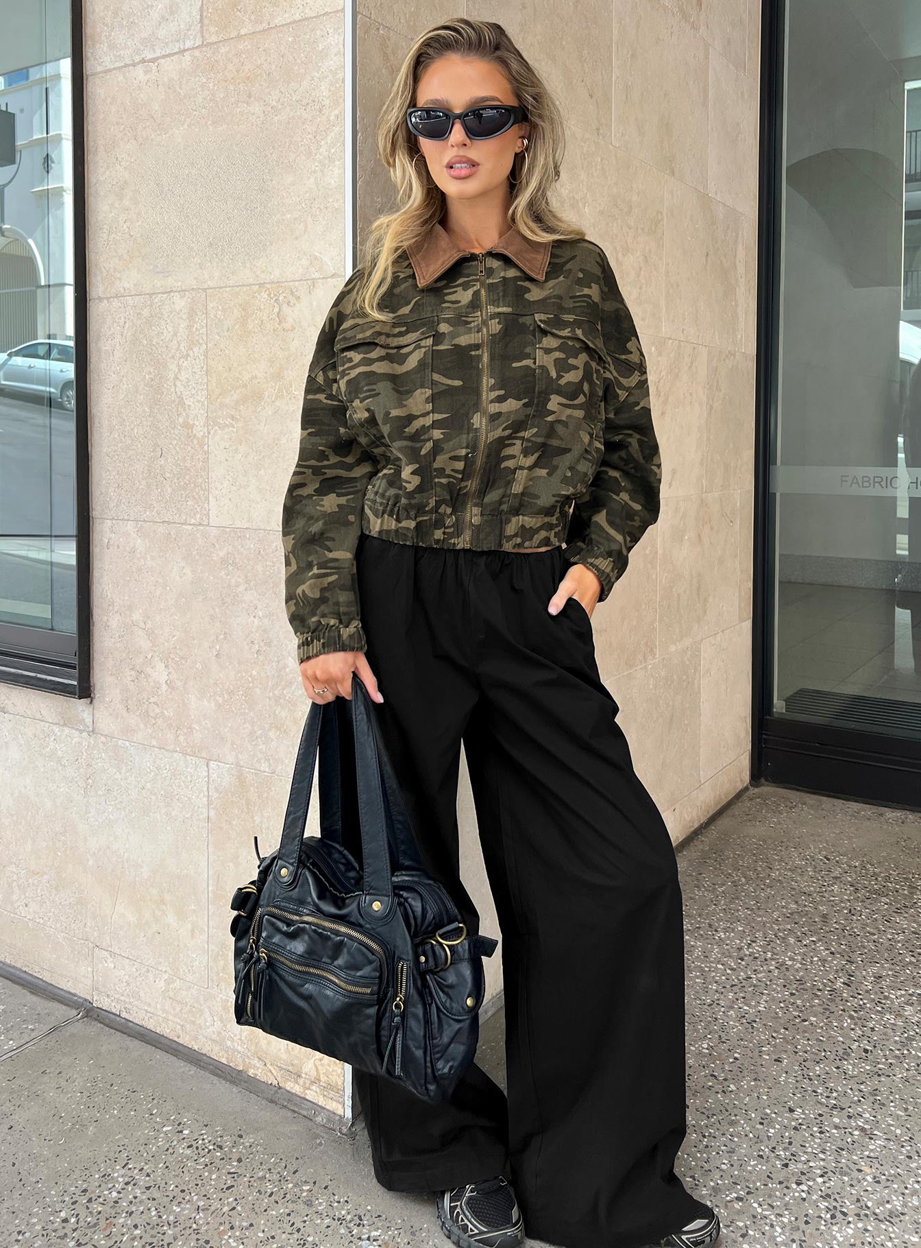 Showcasing Lunea Concealed Waistband Pants Black in womens-regular-pants with high-rise front view of model wearing Princess Polly