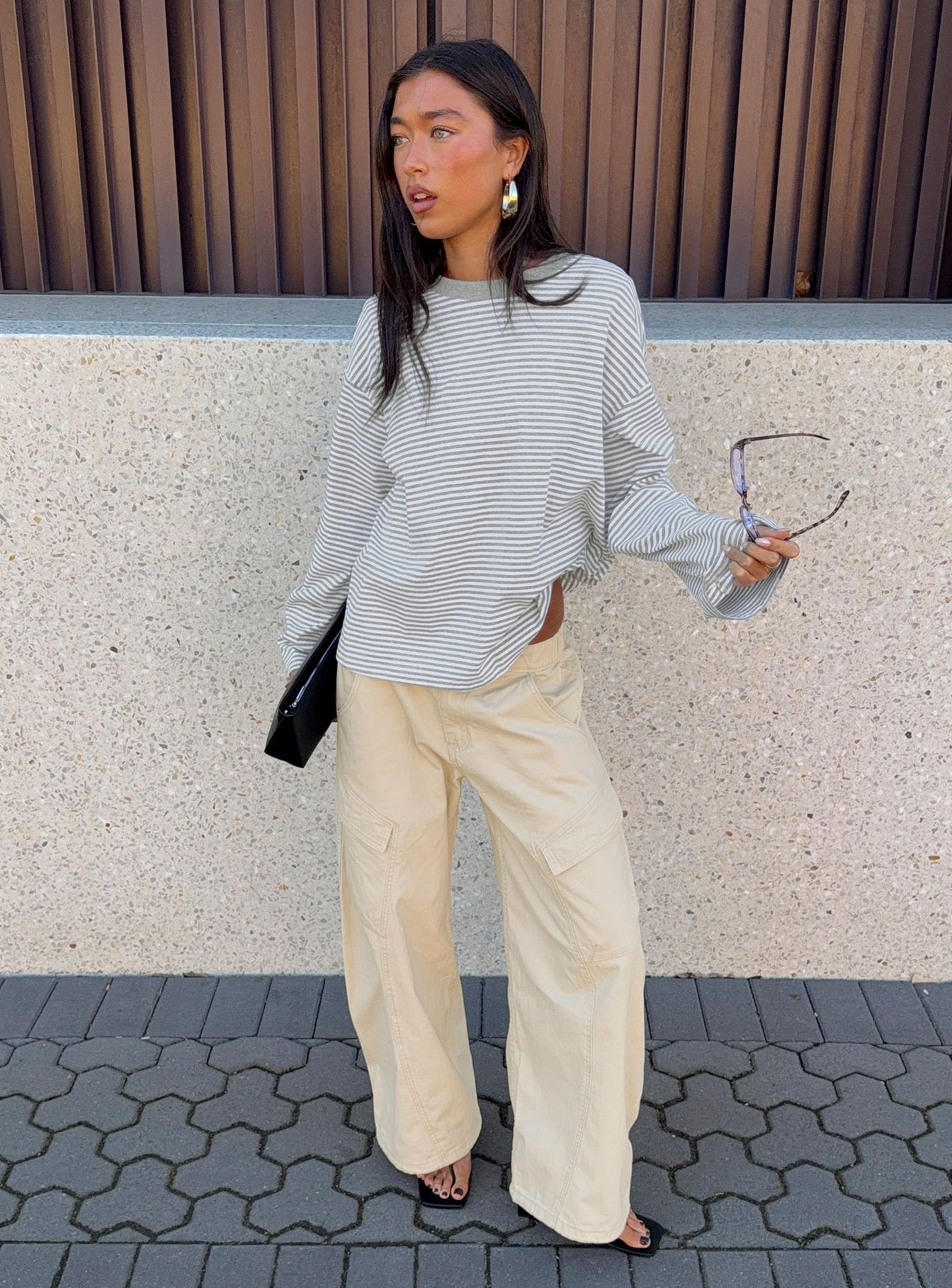 front view of model wearing Princess Polly Selective Memory Low Rise Wide Leg Cargo Pants Cream Low Rise Pants 