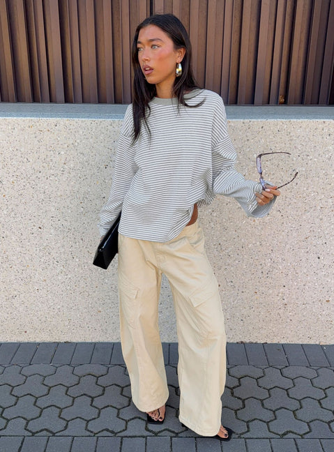 front view of model wearing Princess Polly Selective Memory Low Rise Wide Leg Cargo Pants Cream Low Rise Pants 