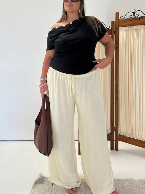 Showcasing Finesse Pants Yellow Curve womens-regular-pants with mid-rise front view of model wearing
