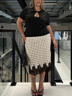 Showcasing the Downtown Scene Lace Trim Maxi Skirt Cream Polka Curve in womens-skirts with midi length front view of model wearing Princess Polly