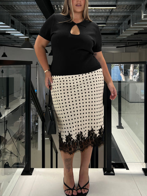 Showcasing the Downtown Scene Lace Trim Maxi Skirt Cream Polka Curve in womens-skirts with midi length front view of model wearing Princess Polly