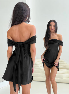 back view of model wearing Princess Polly Adoration Mini Dress Black Petite Straight Neck 
