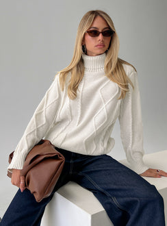 back view of model wearing Princess Polly Tarynne Cable Knit Turtle Neck Sweater Beige Long 