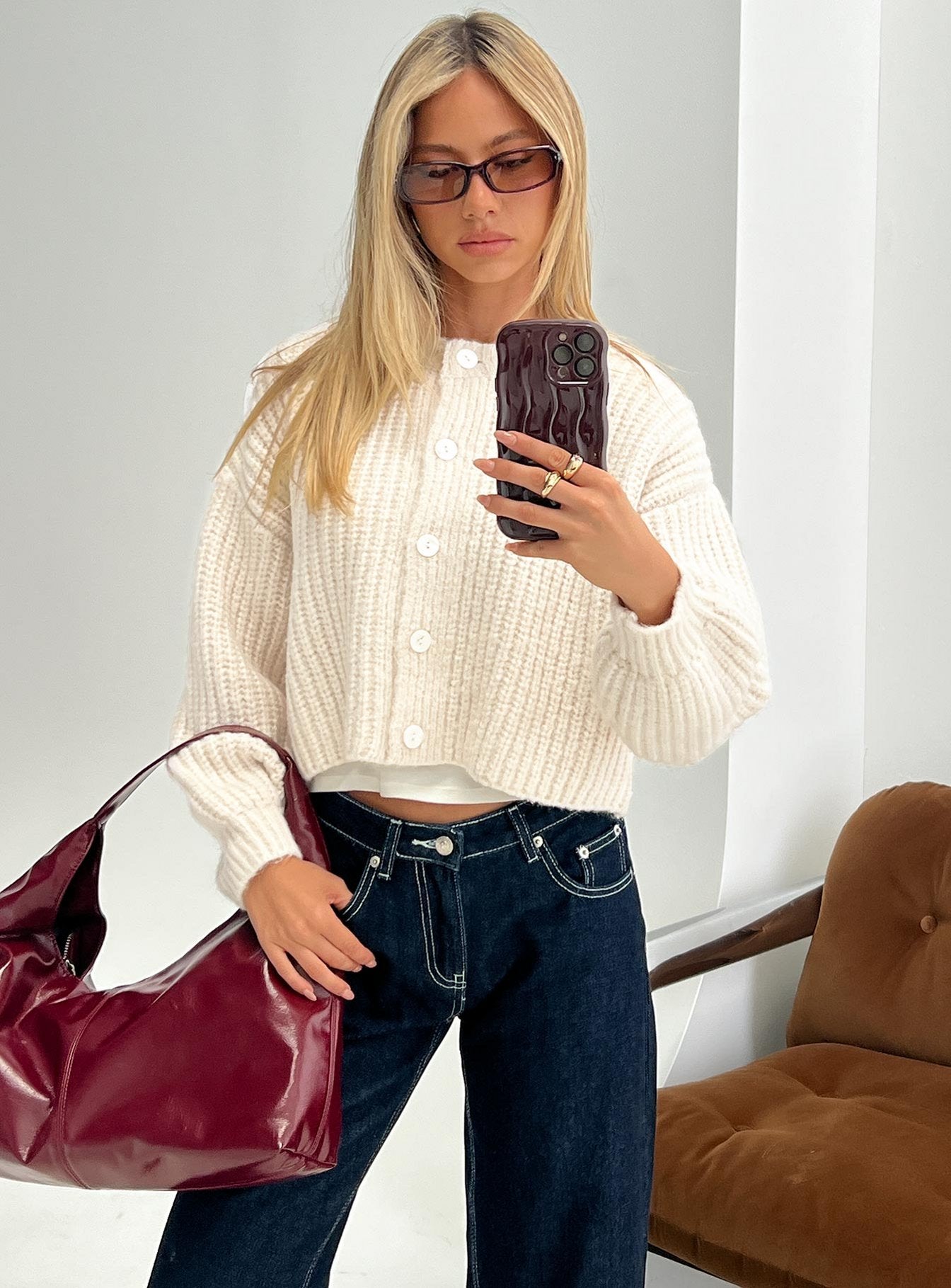 front view of model wearing Princess Polly Hadly Knit Cardigan Cream Cropped Jumpers 