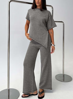 Showcasing the Calisse Knit Wide Leg Pants Mocha in womens regular pants with high-rise design side view of model wearing Princess Polly