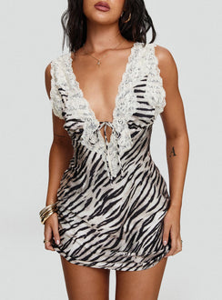 front view of model wearing Princess Polly Nourish Mini Dress Tiger Petite Plunger 