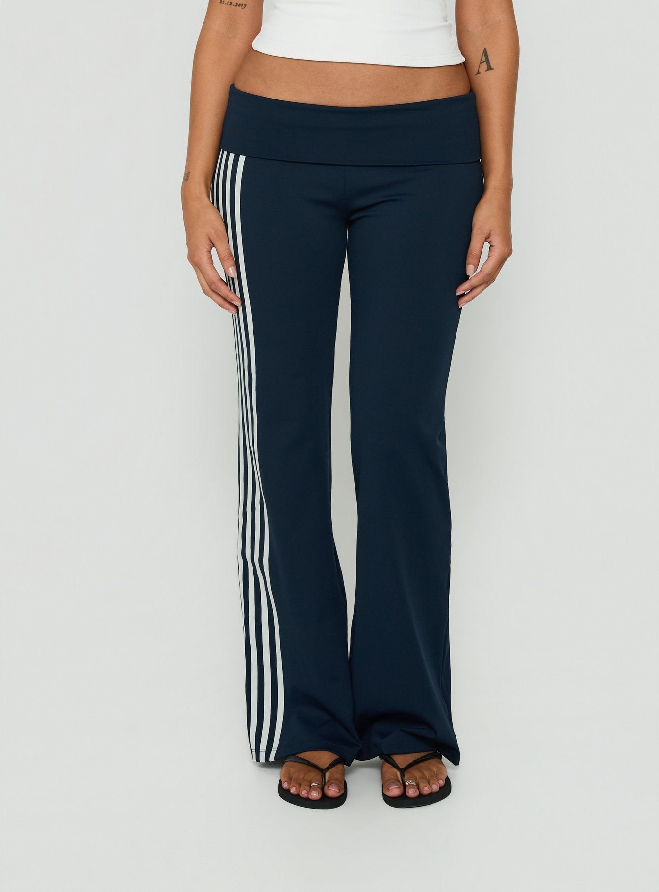Featuring the Layover Straight Leg Pants Navy Stripe in womens-regular-pants with mid-rise waist product Princess Polly