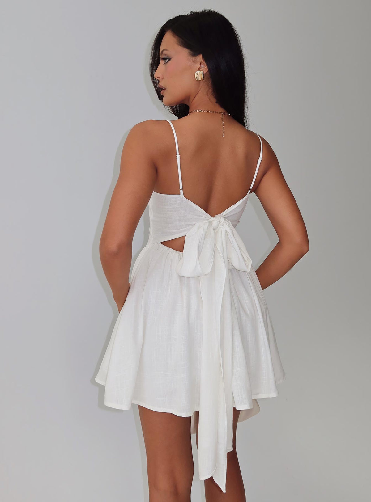 back view of model wearing Princess Polly Angel Wings Tie Up Mini Dress White Scoop Neck 