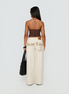 back view of model wearing Princess Polly Than Forever Love Graphic Denim Jeans Cream Low Rise Jeans Jeans 