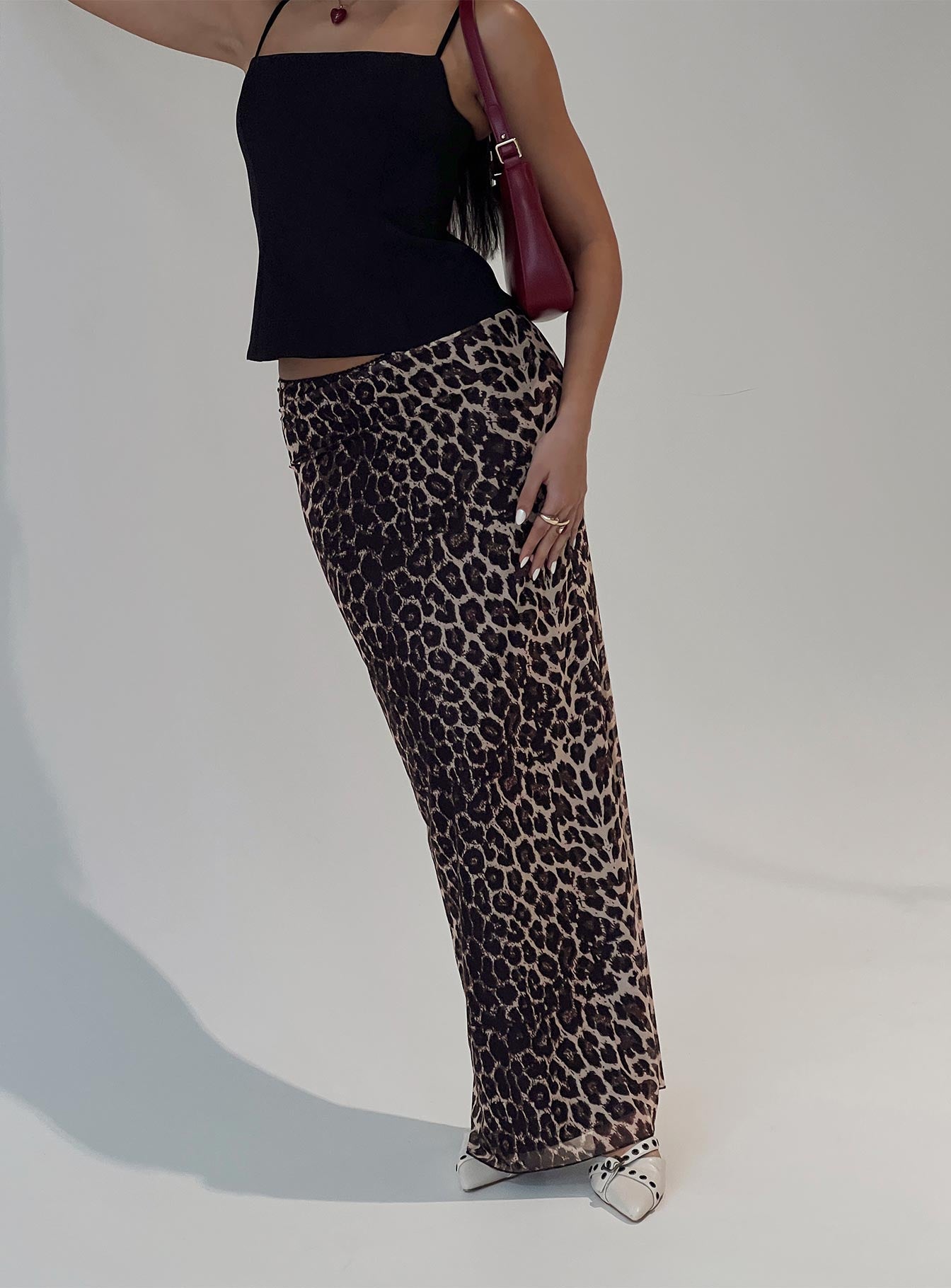 back view of model wearing Princess Polly Ergo Maxi Skirt Leopard Tall Maxi Skirts Skirts 