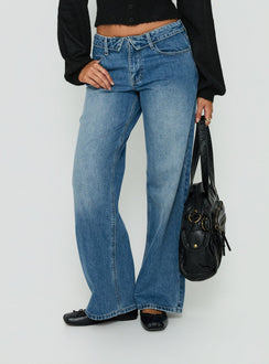 Discover the Serenitia Mid Rise Foldover Relaxed Jeans Vintage Mid Blue in womens-jeans with belt front view of model wearing Princess Polly
