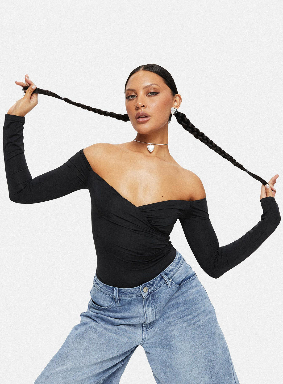 front view of model wearing Princess Polly Tarine Wrap Bodysuit Black Long Sleeve Tops Bodysuit 