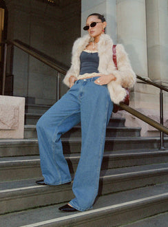 side view of model wearing Princess Polly Maryanne Mid-rise Relaxed Denim Jeans Mid Wash Denim Tall Mid Rise 