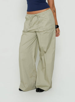 Showcasing Toren Drawstring Straight Leg Pants Stone womens-regular-pants with mid-rise front view of model wearing Princess Polly