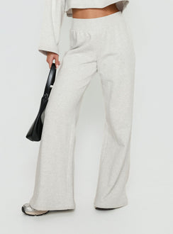 side view of model wearing Princess Polly Peaks Flared Track Pants Snow Marle Mid Rise Pants Pants 