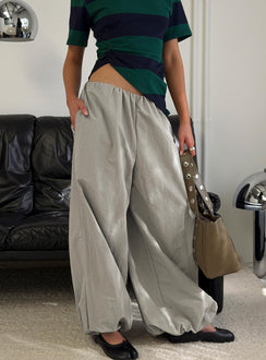 Showcasing the Your Orbit Nylon Baggy Pants Grey womens-regular-pants with high-rise front view of model wearing