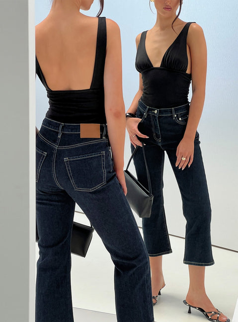 back view of model wearing Princess Polly Cindee High Rise Cropped Jeans Raw Indigo High Rise Jeans 
