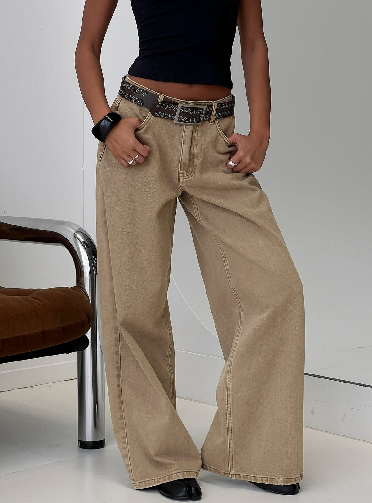 front view of model wearing Princess Polly Naylor Mid Rise Wide Leg Jeans Light Brown Wash Mid Rise Jeans 