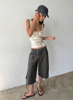 Showcasing the Relaxer 3/4 Cargo Pants Charcoal in womens-regular-pants with mid-rise side view of model wearing Princess Polly