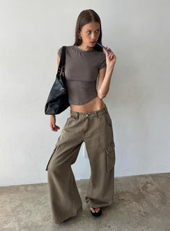 Showcasing the Hudsen Cargo Pants Khaki in womens-regular-pants featuring mid-rise front view of model wearing Princess Polly