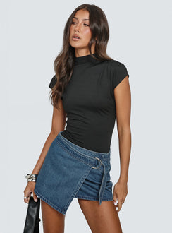   side view of model wearing Princess Polly Elinora Wrap Mini Skirt Mid Blue Wash Mini Skirts 