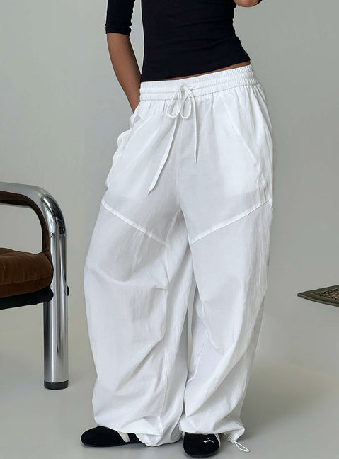 Discover the Mankind Baggy Cargo Pants White in womens-regular-pants with mid-rise, front view of model wearing Princess Polly