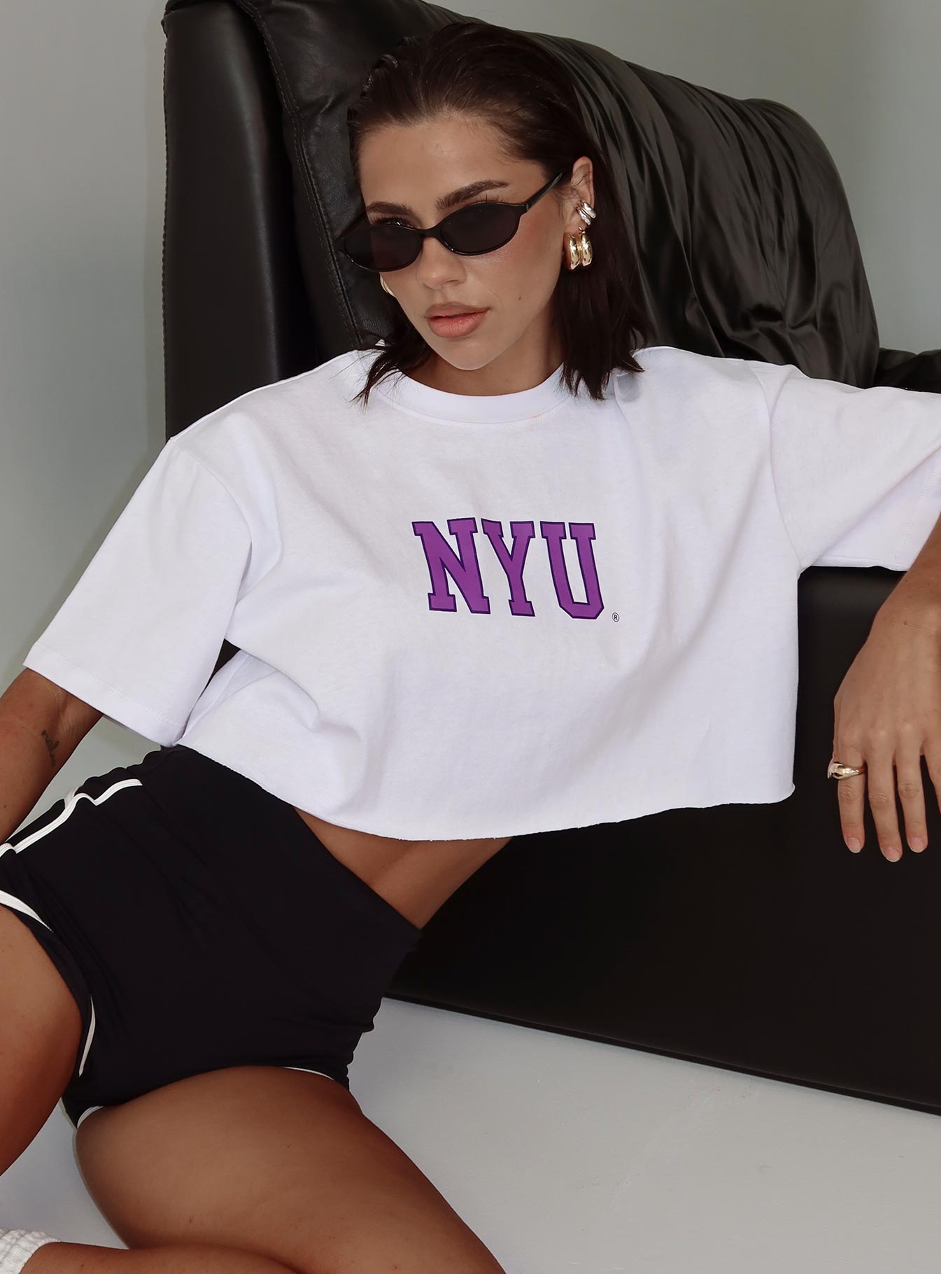 front view of model wearing Princess Polly Nyu Track Tee White Half Sleeves Crew Neck 
