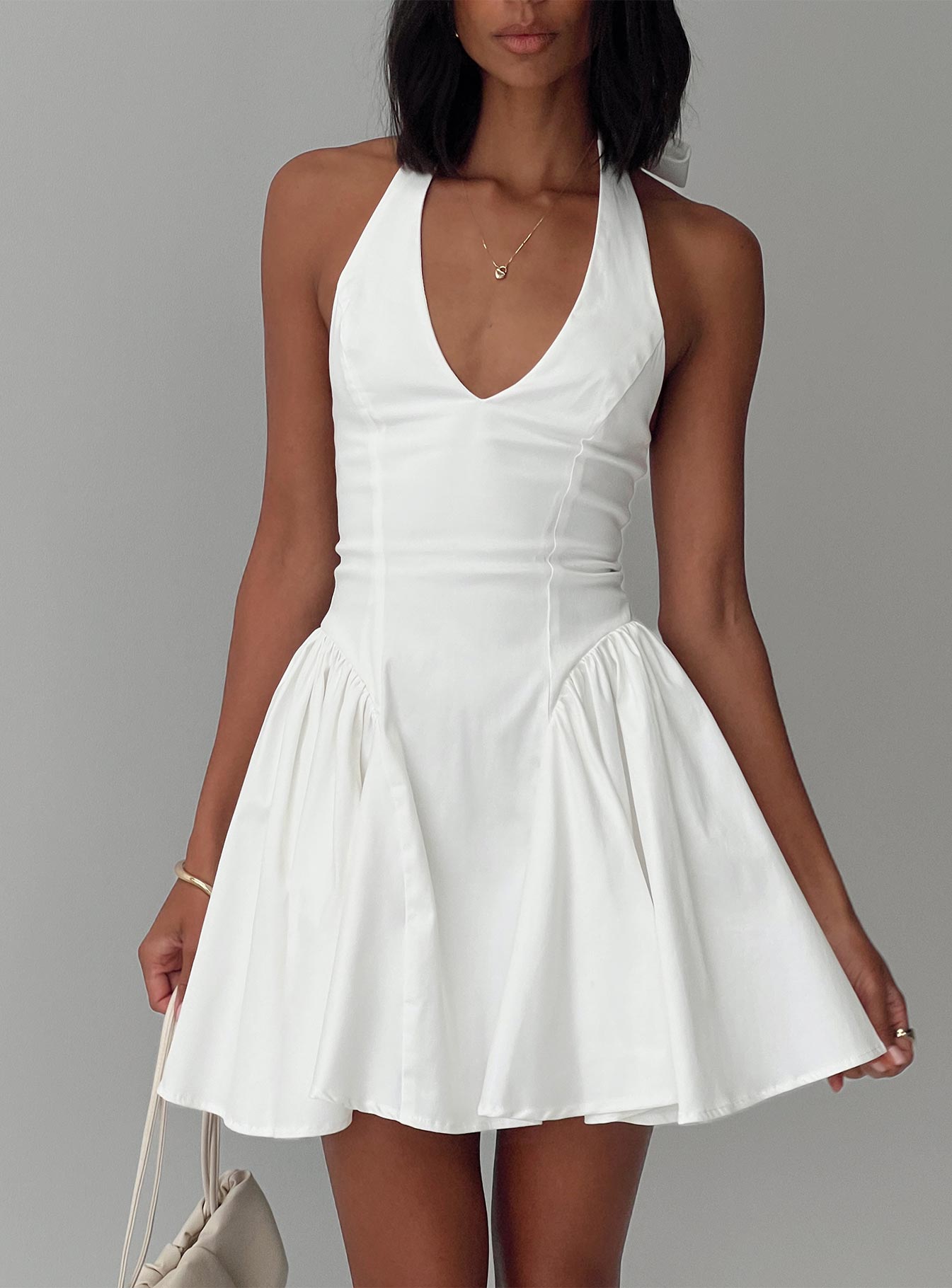front view of model wearing Princess Polly Karisse Halter Mini Dress White Plunger 