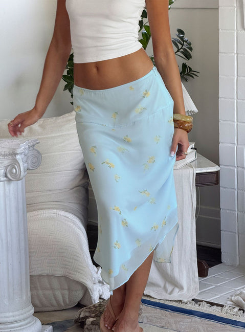back view of model wearing Princess Polly Daphene Asymmetrical Midi Skirt Blue Floral Midi Skirts 