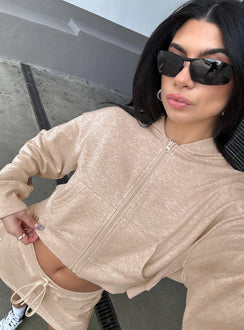 side view of model wearing Princess Polly Revive Zip Through Hoodie Oat Marle cropped Jumpers 