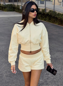 front view of model wearing Princess Polly Daytime Cropped Blouson Hoodie Buttercream Cropped Jumpers 