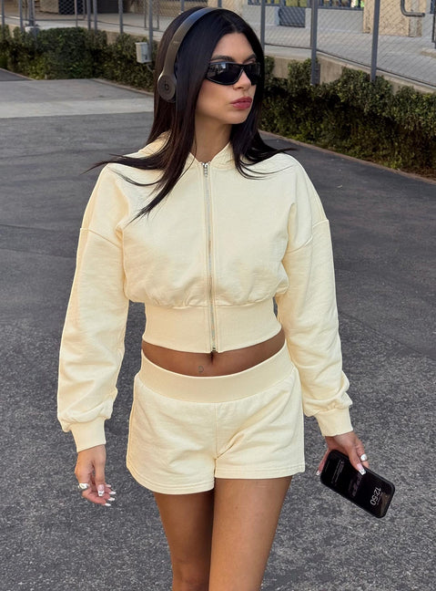 front view of model wearing Princess Polly Daytime Cropped Blouson Hoodie Buttercream Cropped Jumpers 