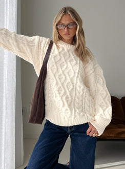 Featuring the Rorey Cable Knit Crew Neck Sweater White womens-jumpers with oversized fit in long length front view of model wearing Princess Polly