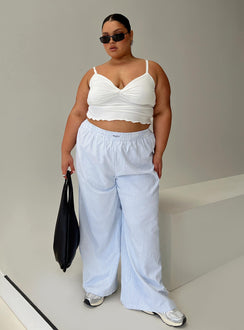 front view of model wearing Princess Polly Beach House Pants Blue Stripe Curve Pants 
