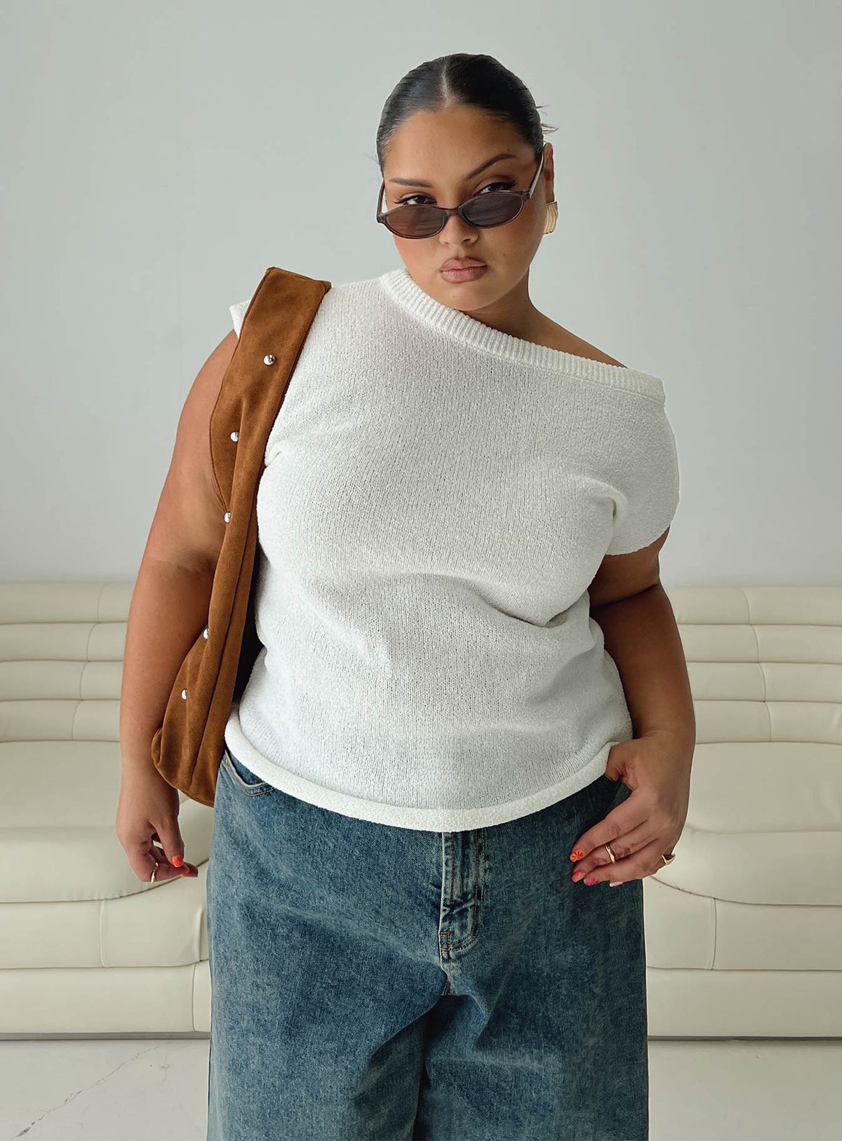 front view of model wearing Princess Polly Ashfield Off Shoulder Top White Curve Short Sleeves Asymmetric Neckline 