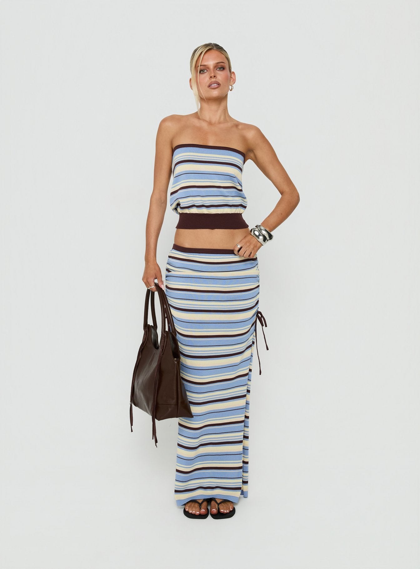 Featuring the Osamie Knit Drawstring Maxi Skirt Multi Stripe in womens-skirts with ruched details and fitted silhouette front view of model wearing Princess Polly