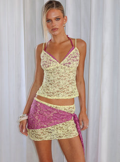 Showcasing the Sirna Lace Wrap Contrast Mini Skirt Lime / Pink womens-skirts mini front view of model wearing Princess Polly